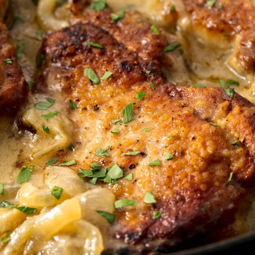 SMOTHERED BONELESS PORK CHOP DINNER